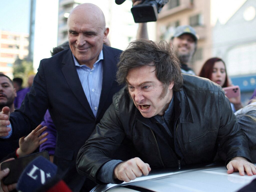 Argentinian President Javier Milei leaves rally after protesters throw rocks | Protests News | USAEMALL.com