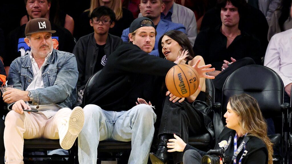 Chargers’ Justin Herbert protects Madison Beer from basketball at Lakers recreation | USAEMALL.com
